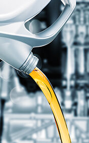 Pouring Synthetic Oil Pouring Synthetic Oil