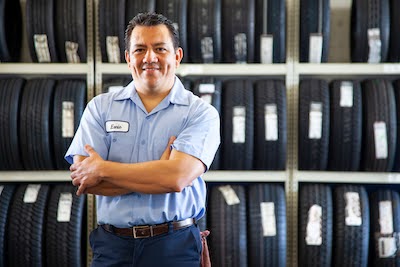 Las Vegas mechanic standing in a tire shop